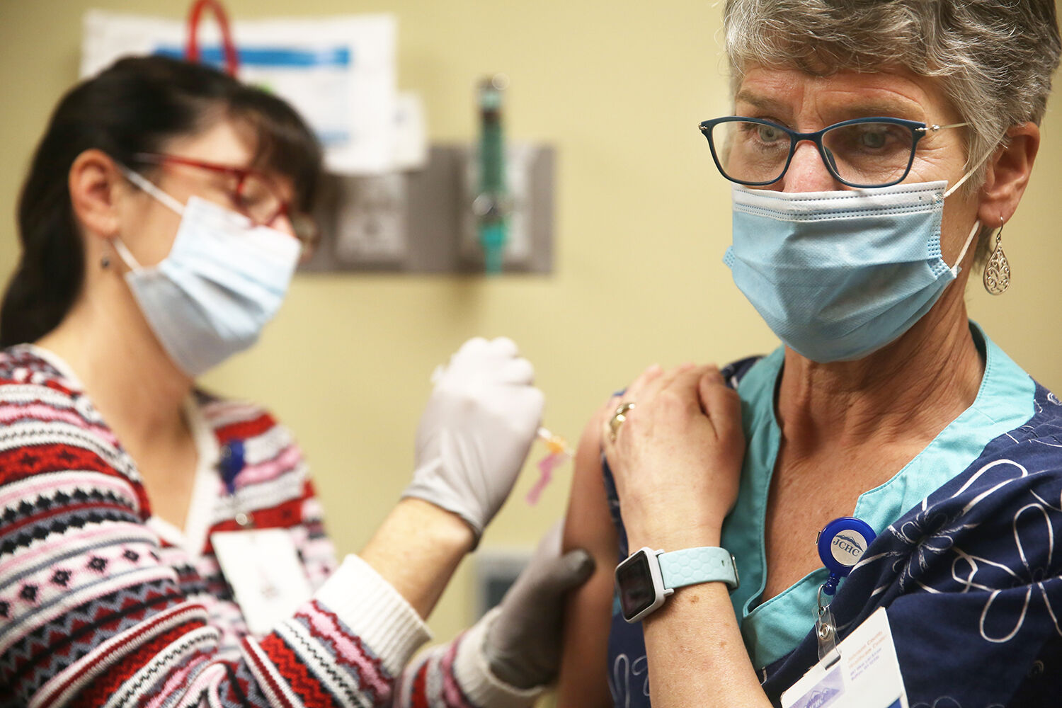 Mary Litzel, Director of Nursing, receives her vaccine